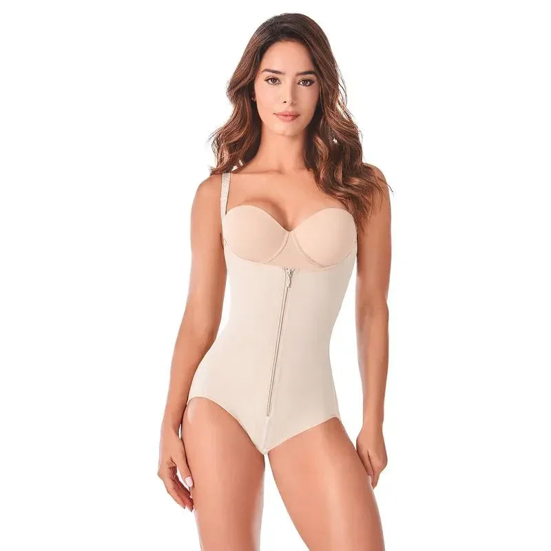 Woman wearing beige full body shaper with zipper closure for tummy control and slimming