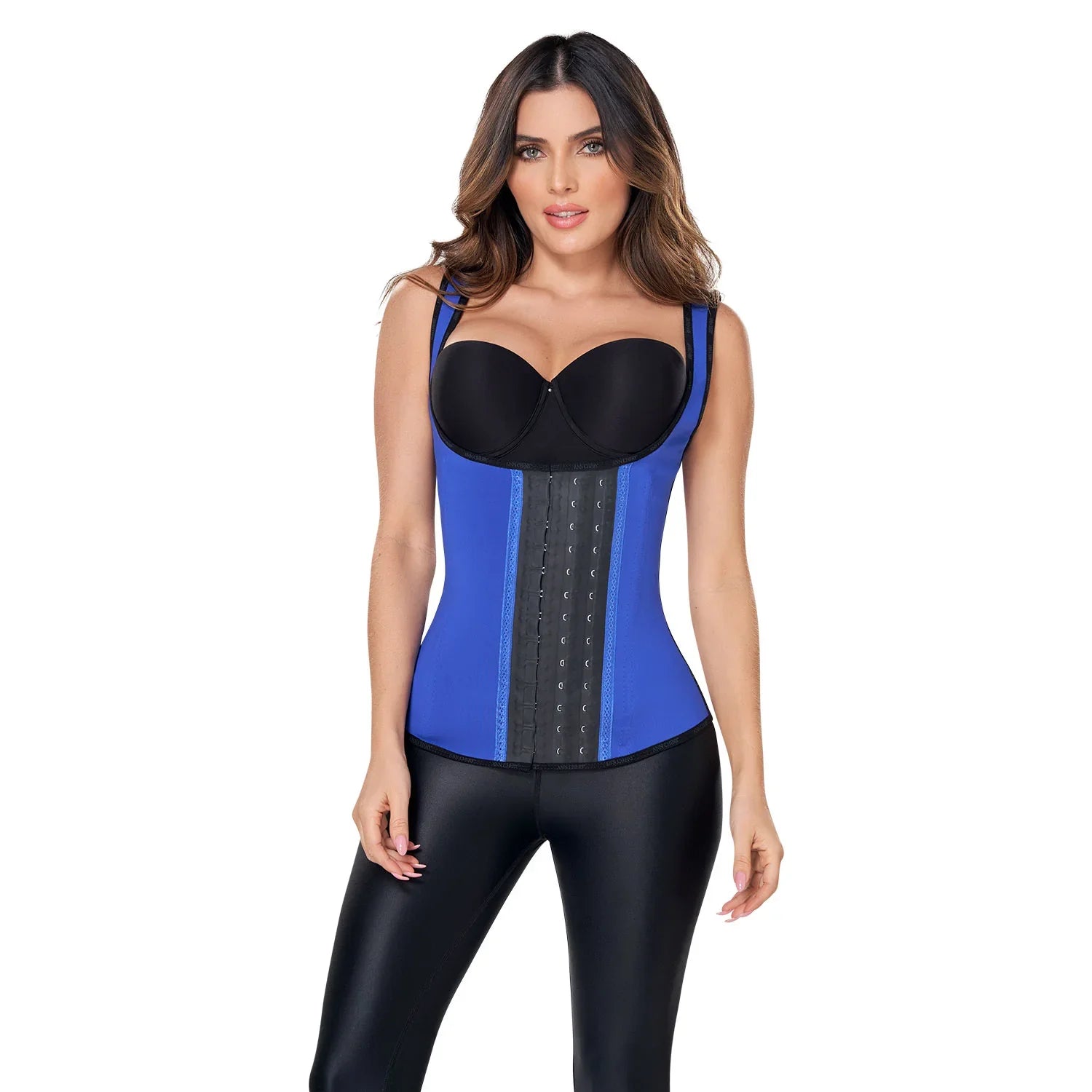 Woman wearing blue latex waist trainer vest with three hook rows, black bra and leggings