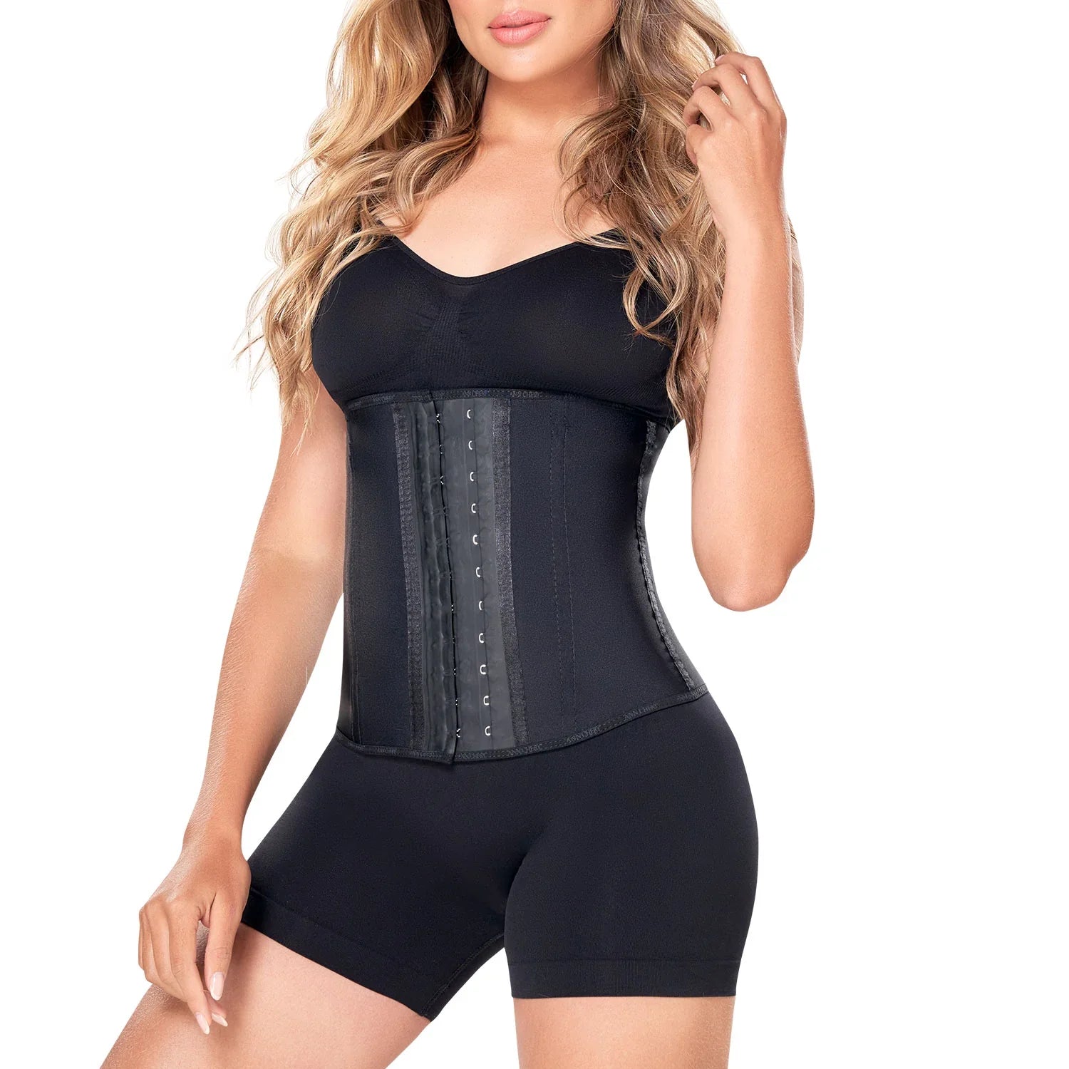 Woman wearing black Ann Chery latex waist trainer shapewear, tummy control, white background