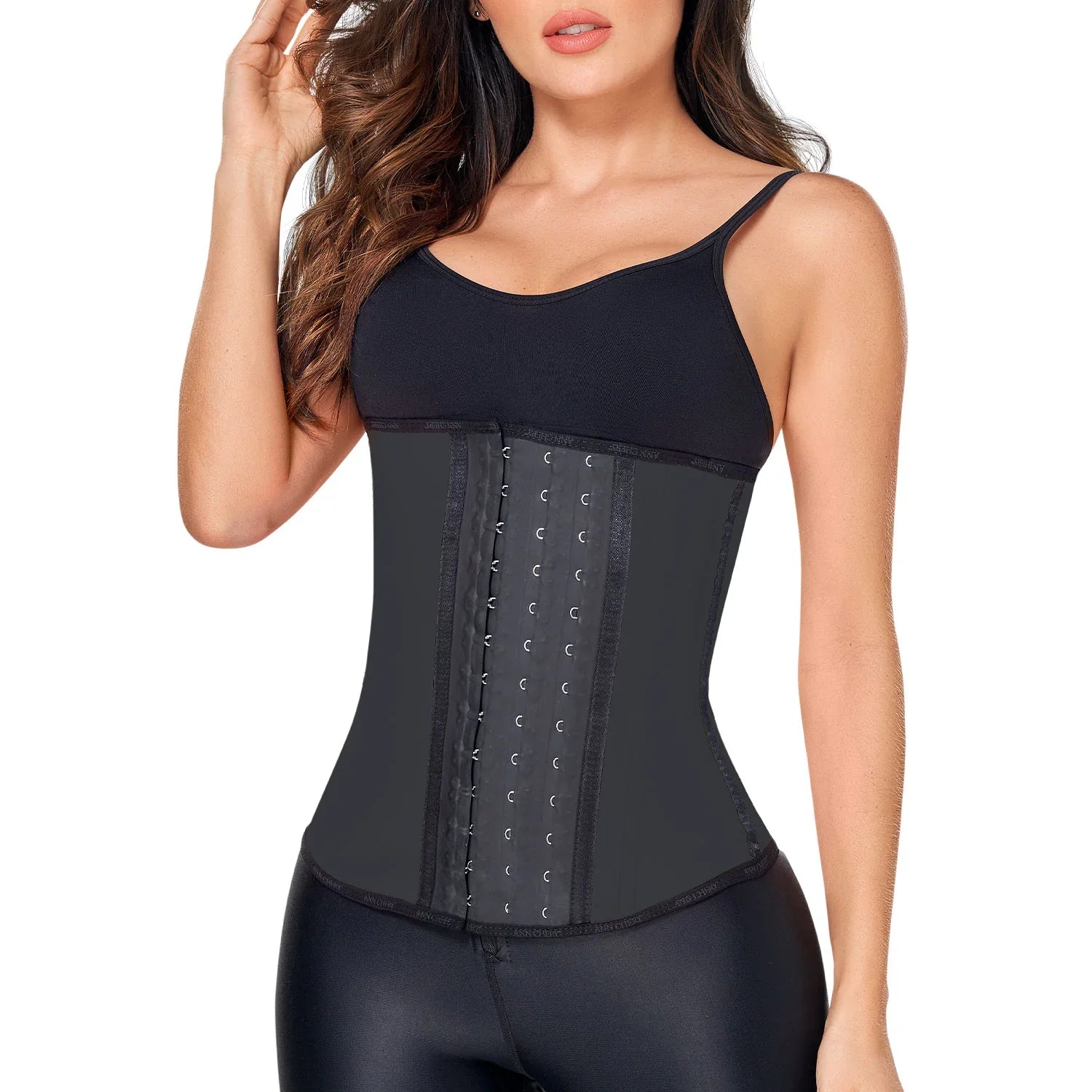 Woman wearing Ann Chery black latex waist trainer with three hooks, tummy control shapewear