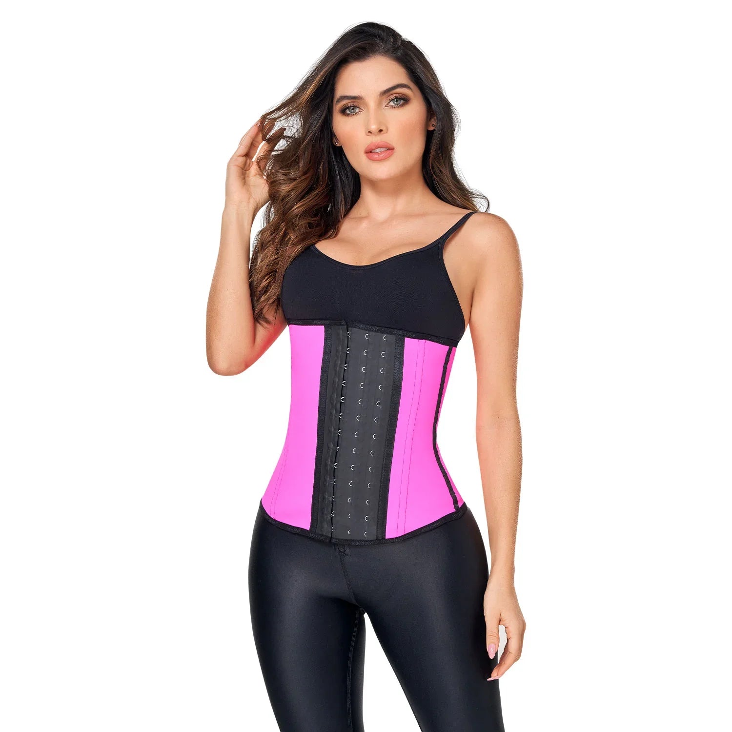 Woman wearing Ann Chery pink latex waist trainer with three hook closure and black tank top