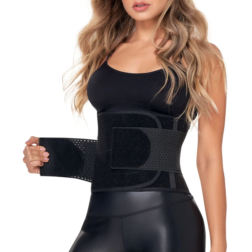 Woman wearing a black latex waist trainer belt for tummy control and body shaping