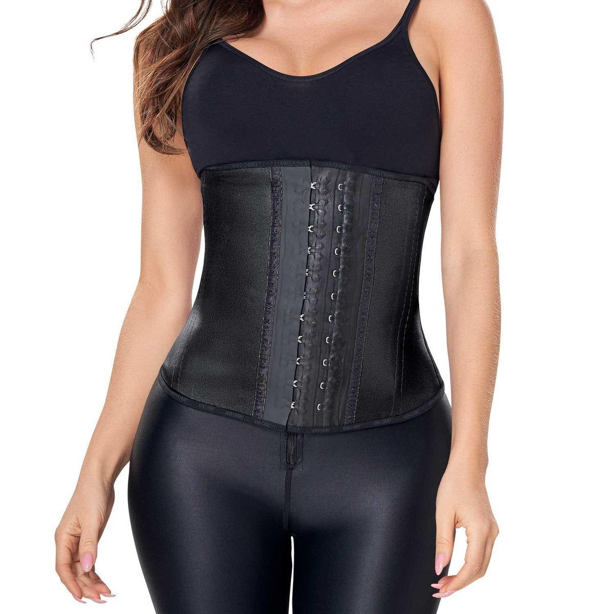 Woman wearing Ann Chery black latex waist trainer with 2 hooks for tummy control