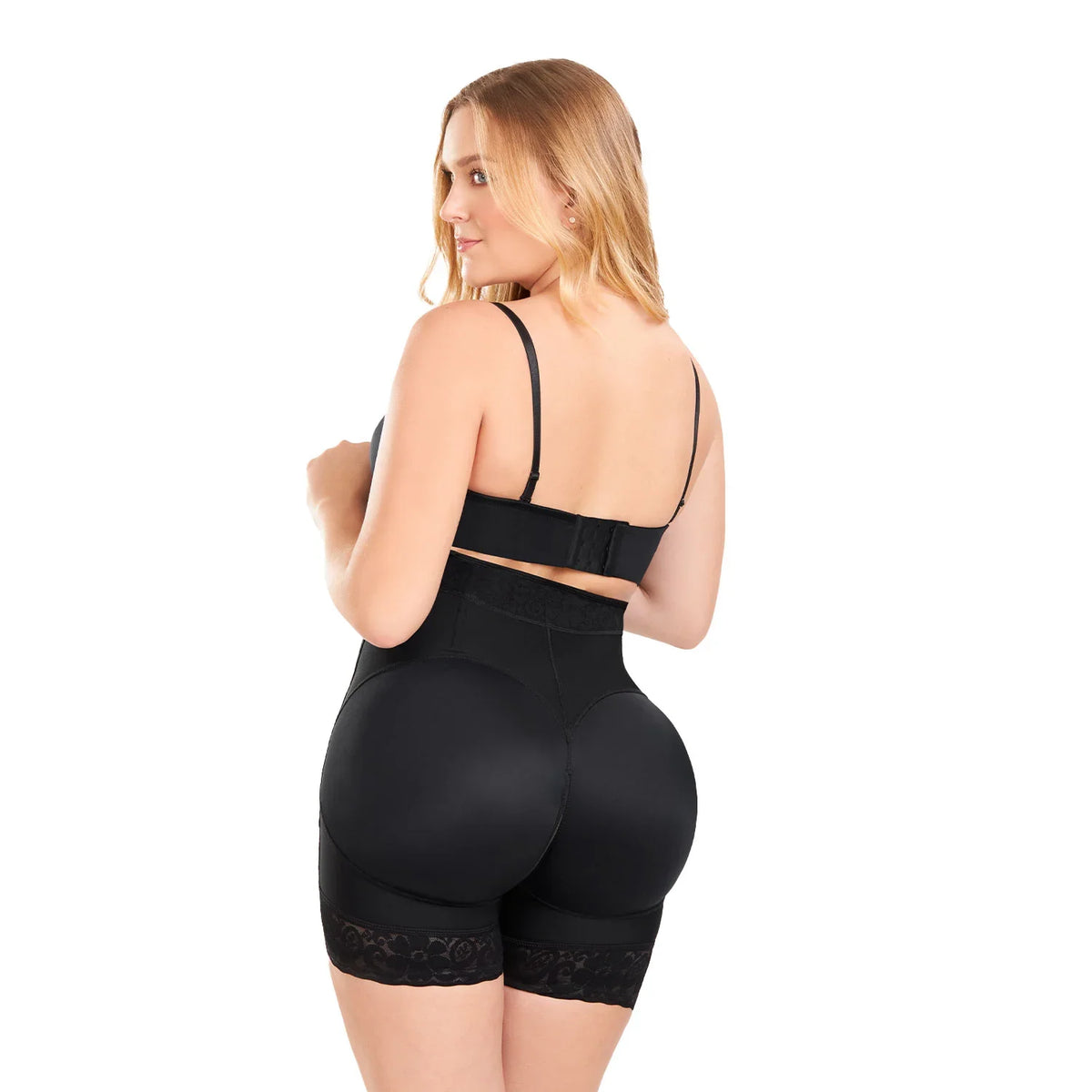 Woman wearing Ann Chery black Colombian faja body shaper with lace trim, back view